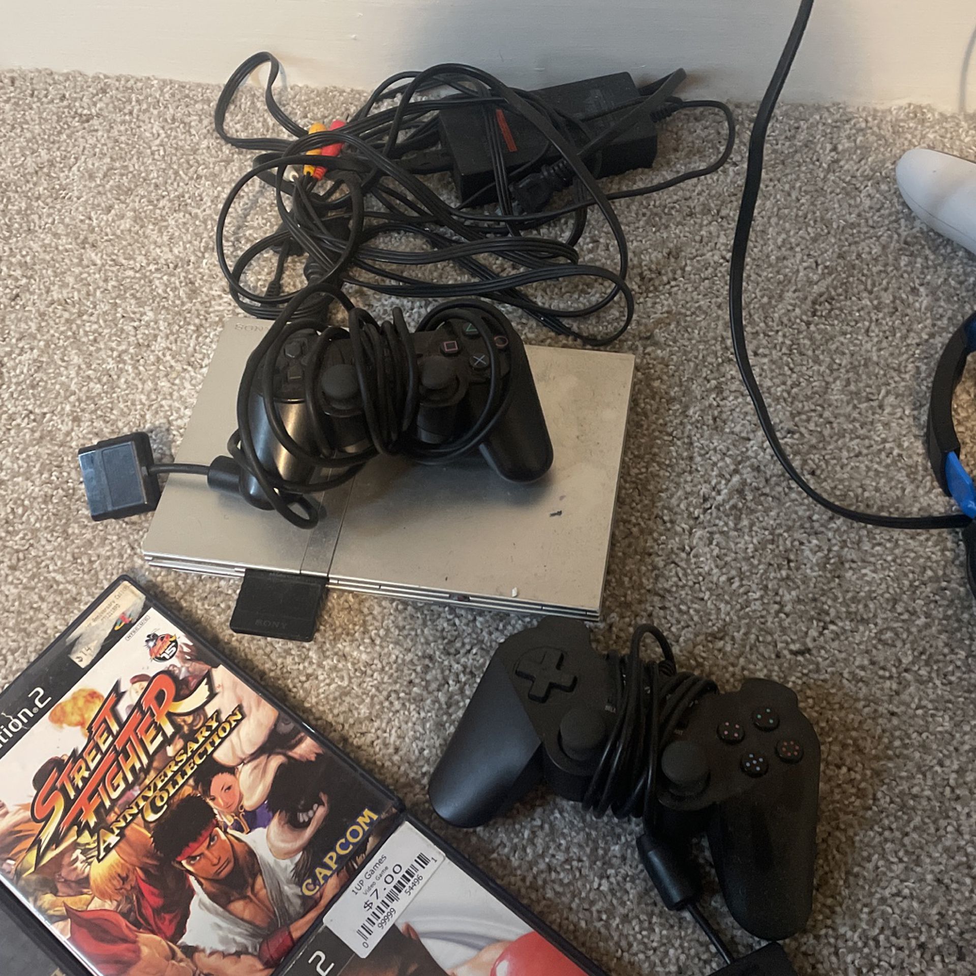 Silver PS2 W/ 10 Games 