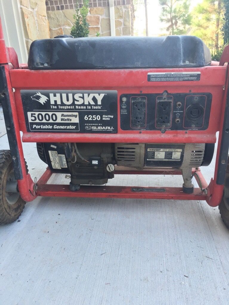 how many horsepower does a husky 5000 watt generator have