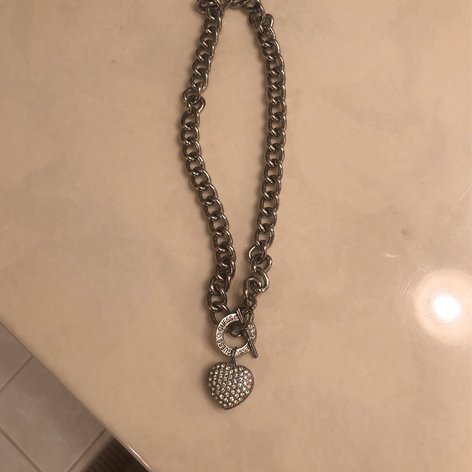 Guess Silvertone choker necklace