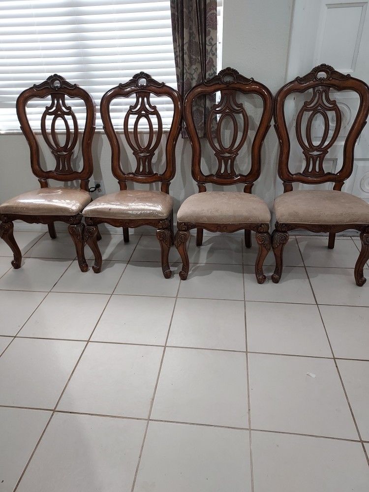 4 chair and some part of the wood is a bit beaten but still good firm price