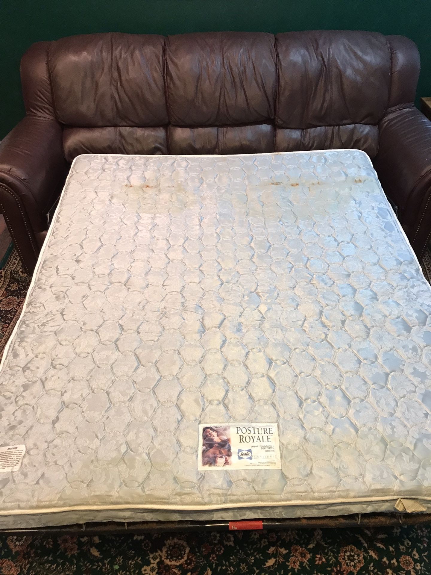 Burgundy Faux leather sofa couch with pull out mattress/bed sleeper