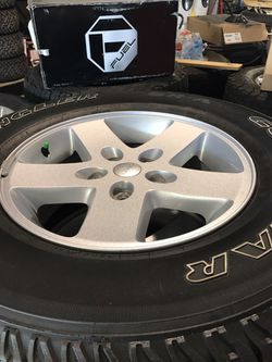 Stock jk wheels and tires Thumbnail