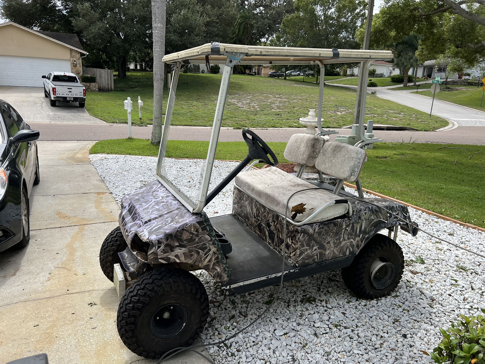 1999 Club Car Lifted Golf Car Needs everything except for Electric Motor