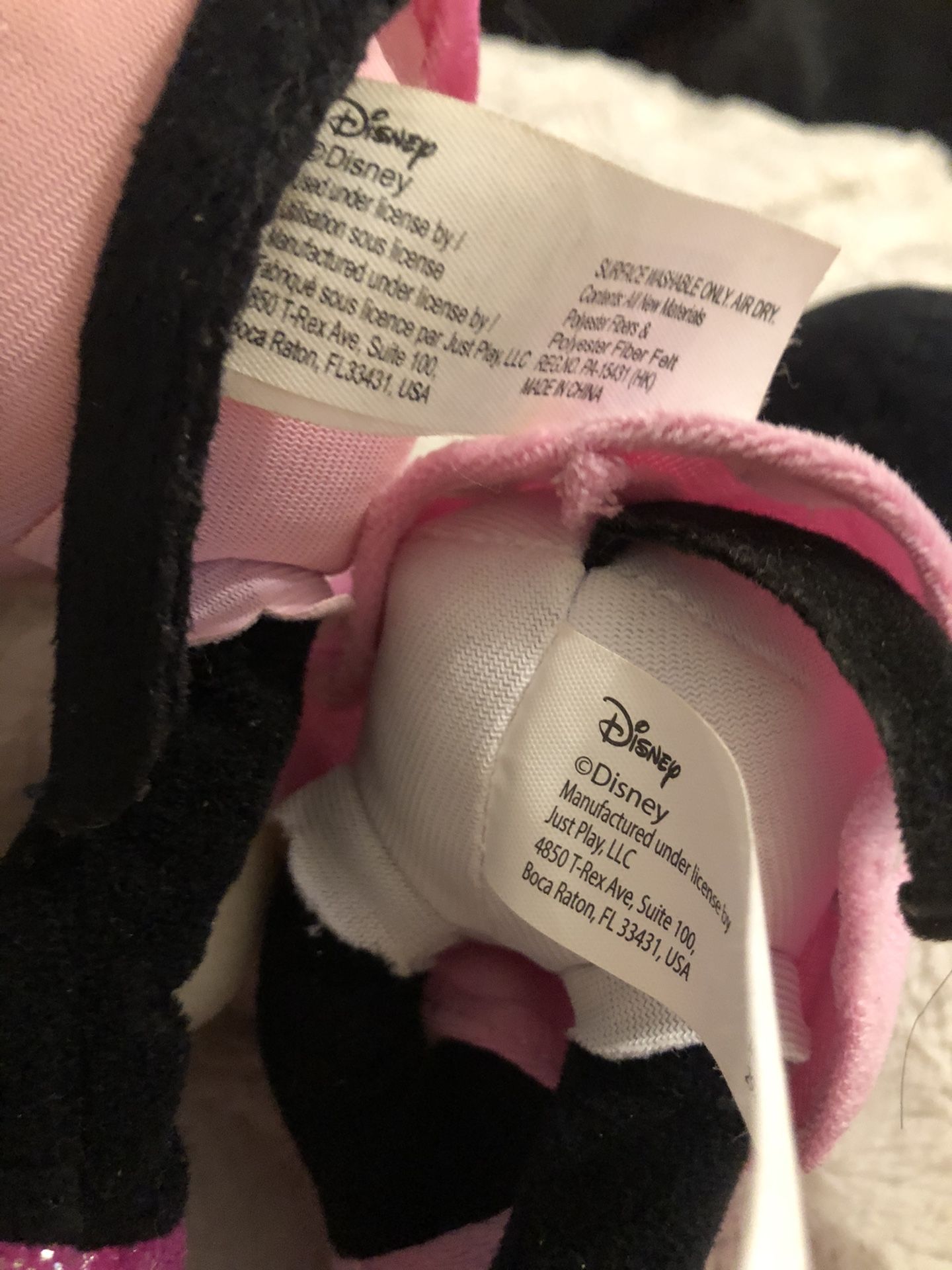 A Little Girl’s Minnie Mouse Bicycle Helmet And 2 Matching Mini Mouse Disney Stuffed Toys