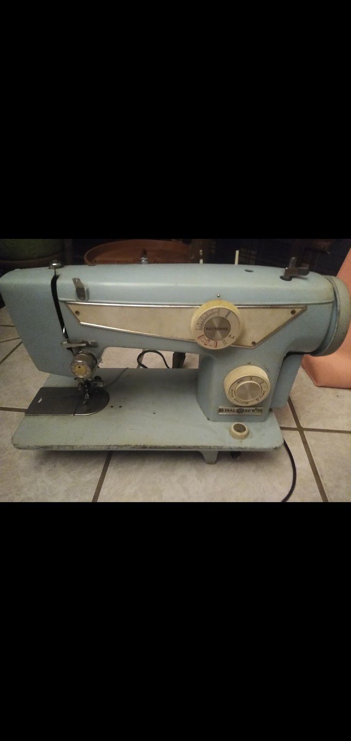 Vintage Sewing Machine And Cabinet