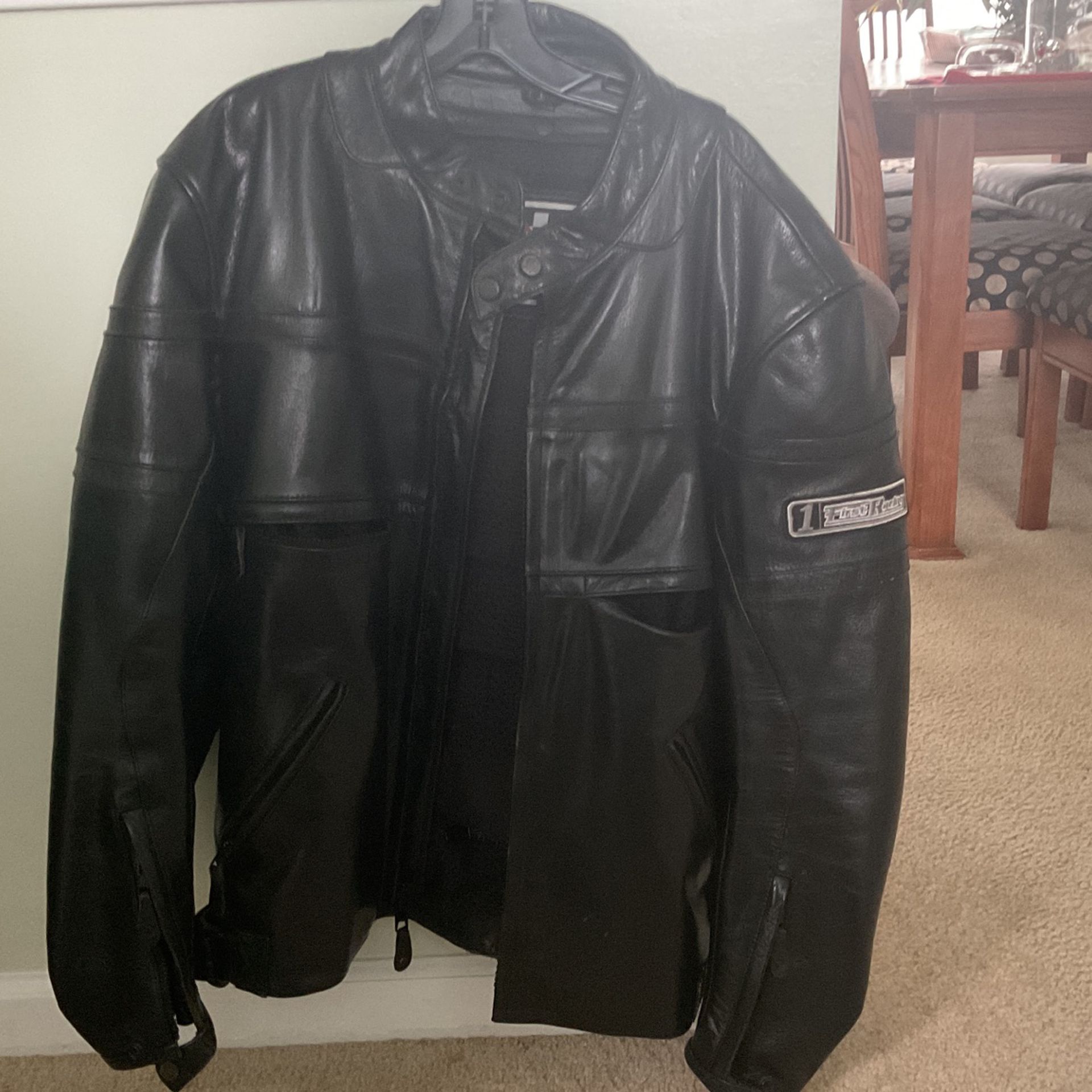 This is a motorcycle jacket larger with a padding at the elbows and back