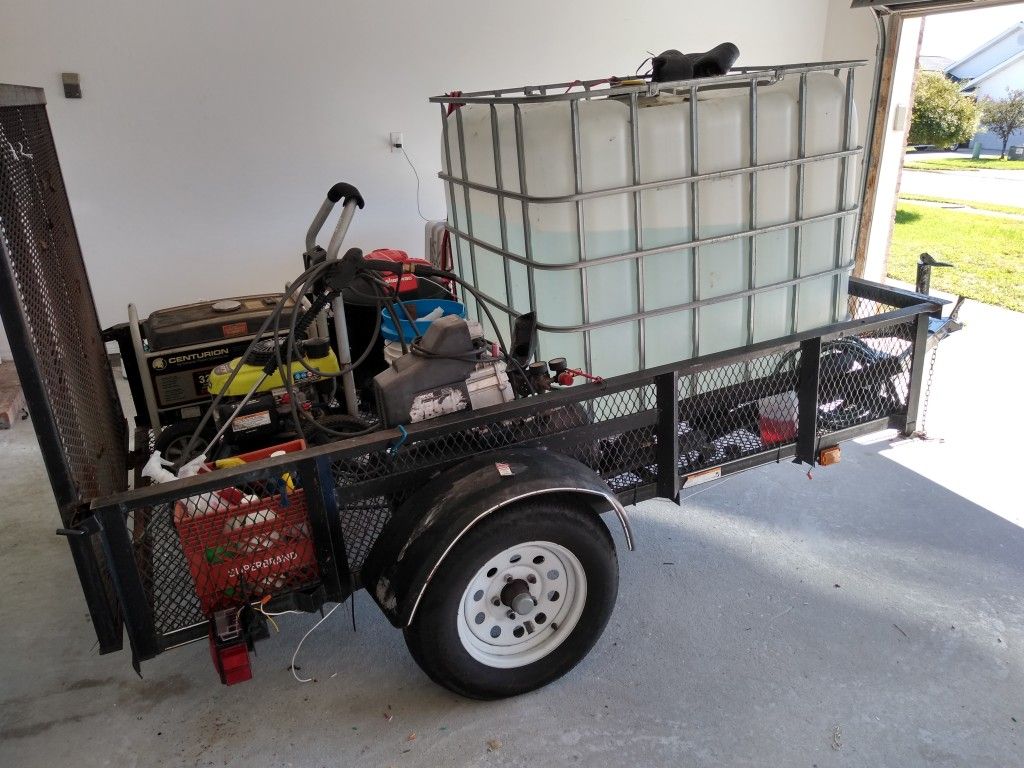 Black trailer with mobile detailing equipment