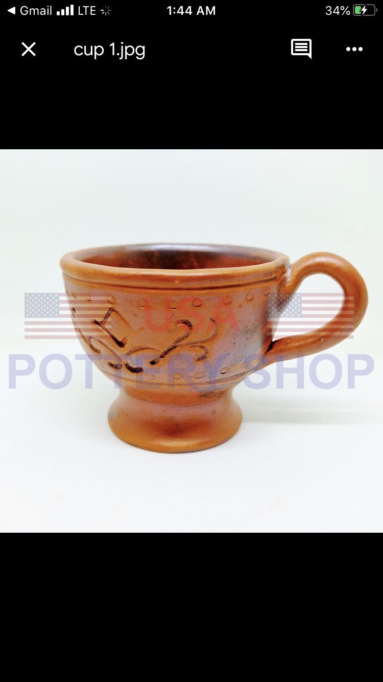 Handmade Pottery tea/coffee cup and saucer.