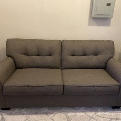 Minimalist Grey Fold Out Couch Thumbnail