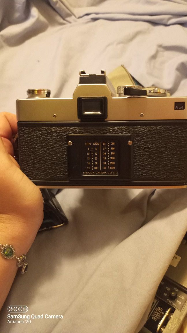 Minolta SRT 202 Vintage Camera with extra accessories