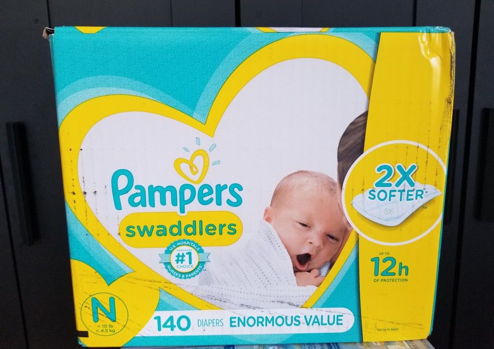 2 boxes..Pampers swaddlers size newborn enormous value pack