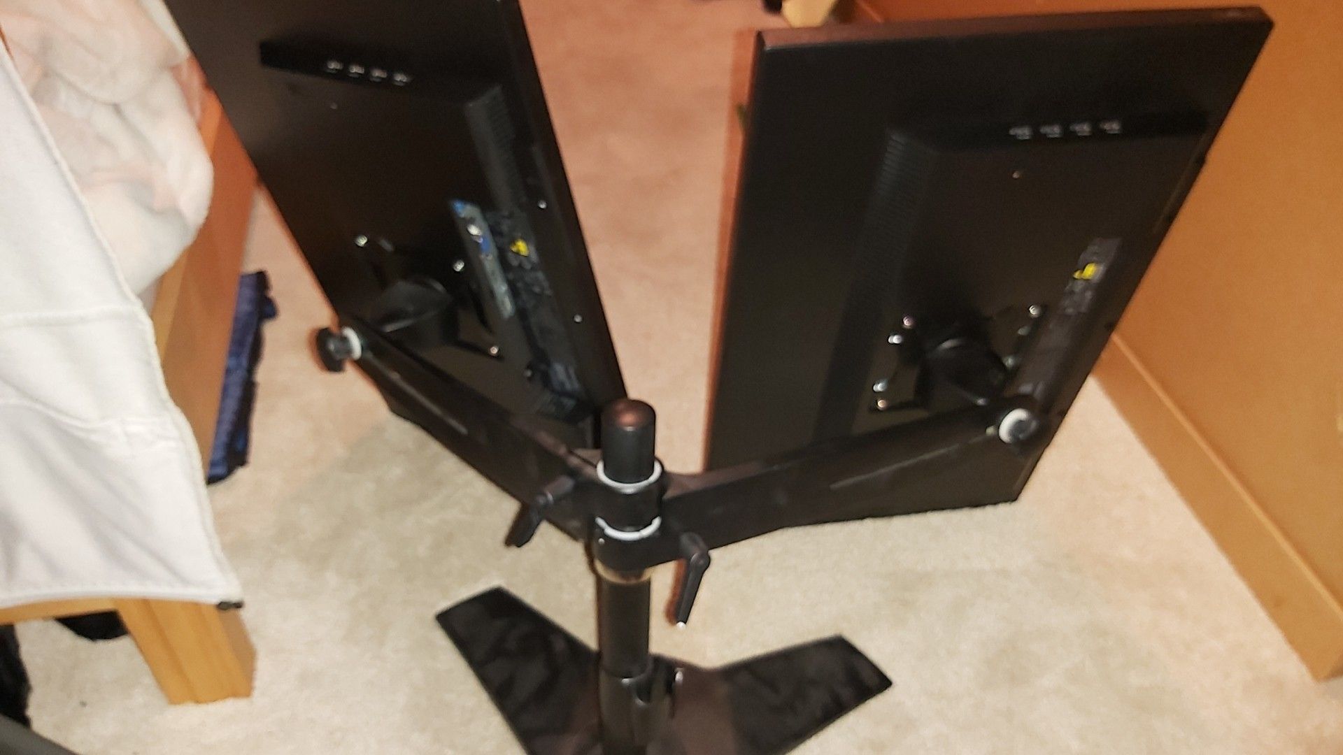 Lenovo dual monitor setup with stands and cables