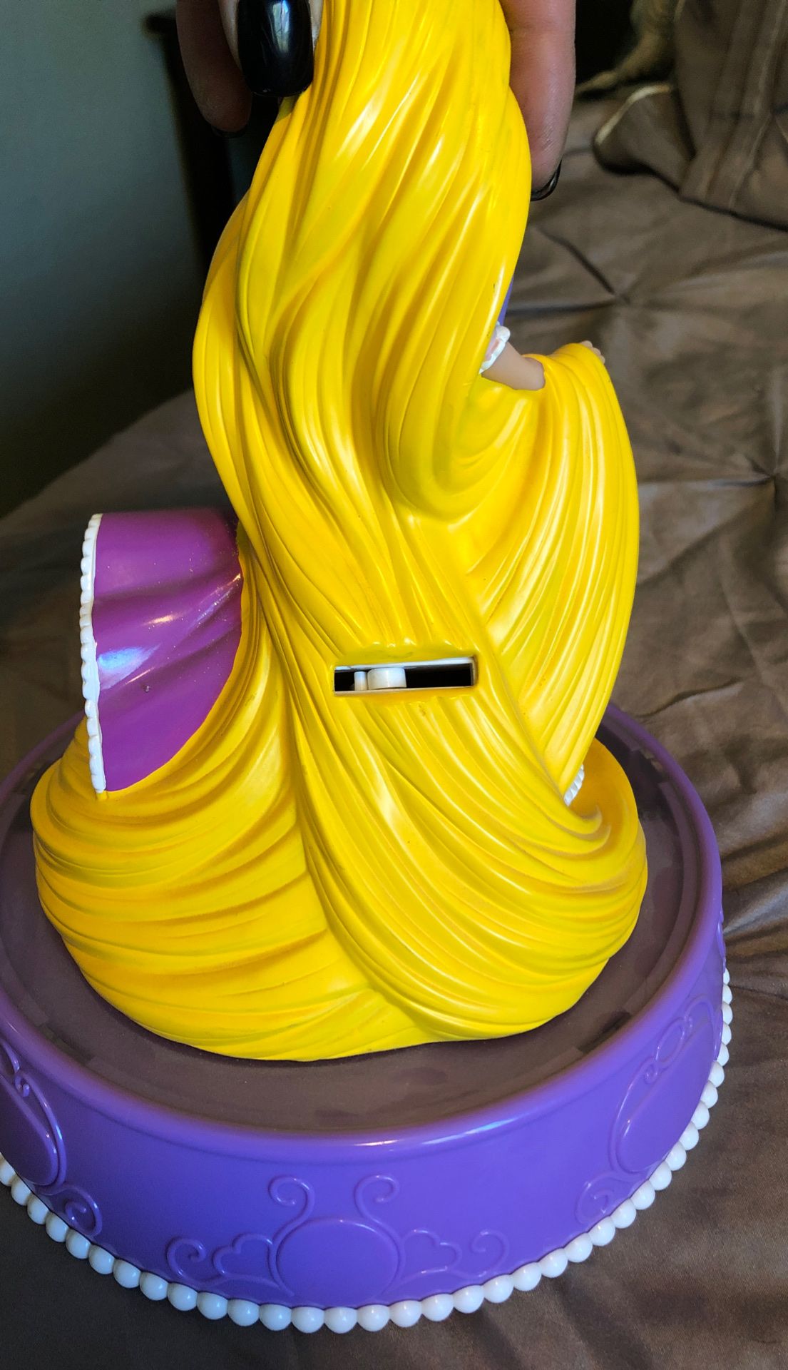 Rapunzel singing piggy bank
