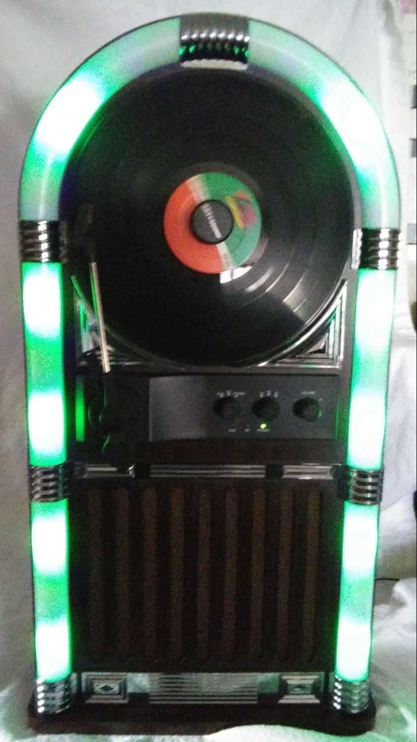 ART+SOUND AR3004 Bluetooth Wireless Jukebox with Vertical Record Player and Retro Light Show!
Details
Styled like a retro jukebox, this record player