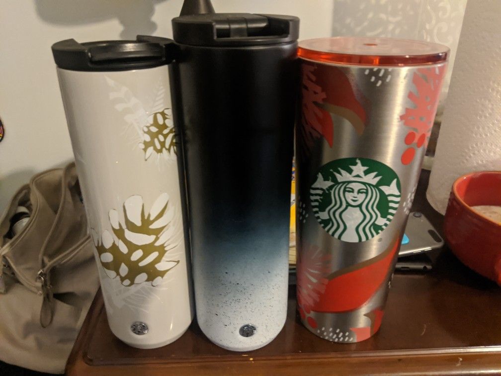 Starbucks tumblers.. Solid Black One Is Sold