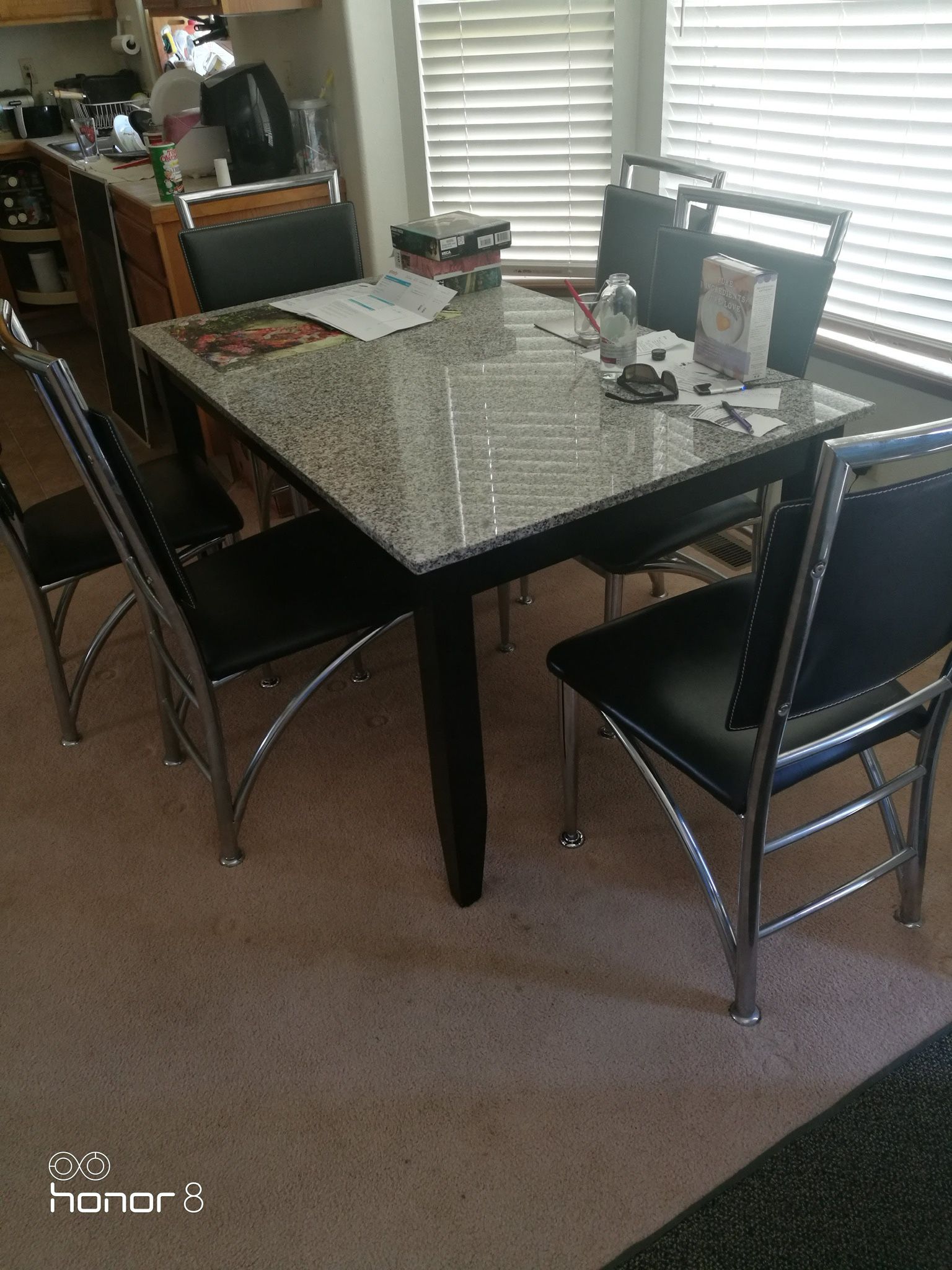 Granite Table With 6 Leather Chairs