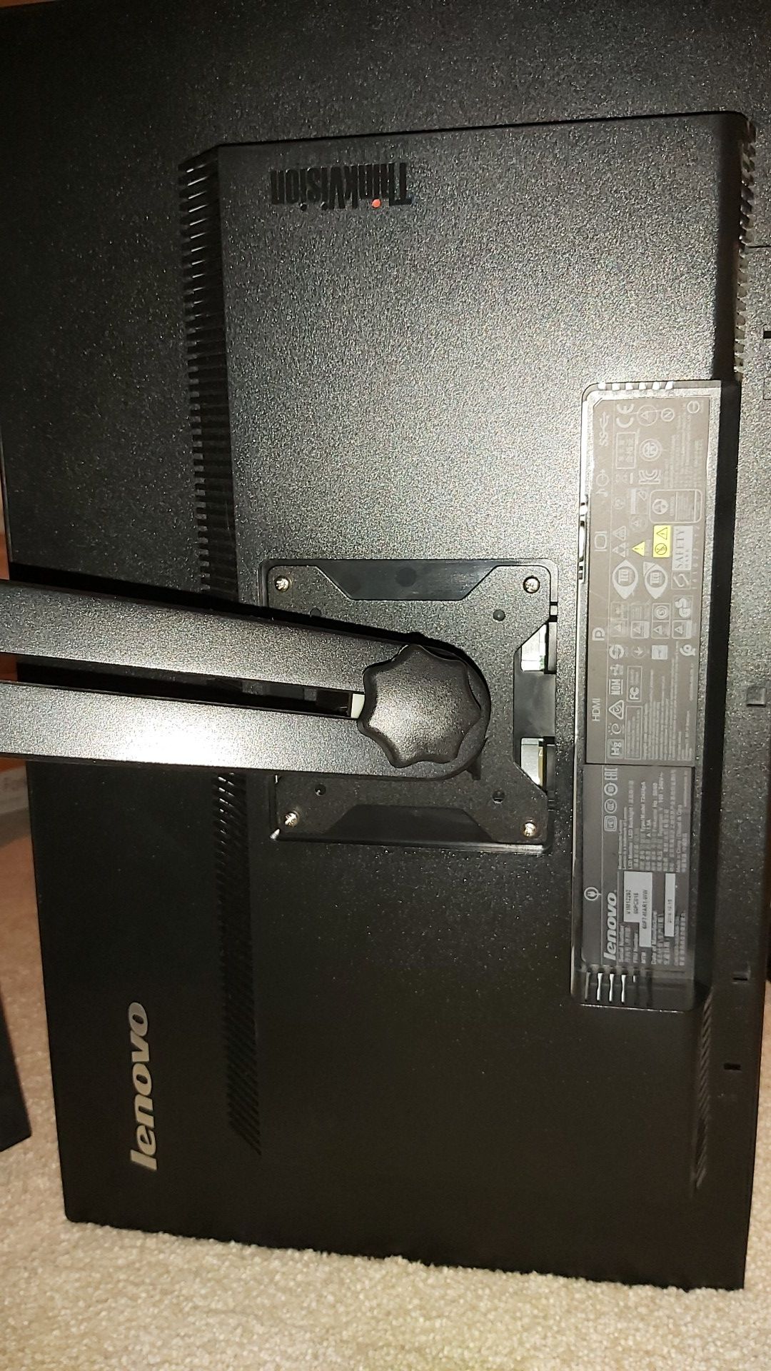 Lenovo dual monitor setup with stands and cables
