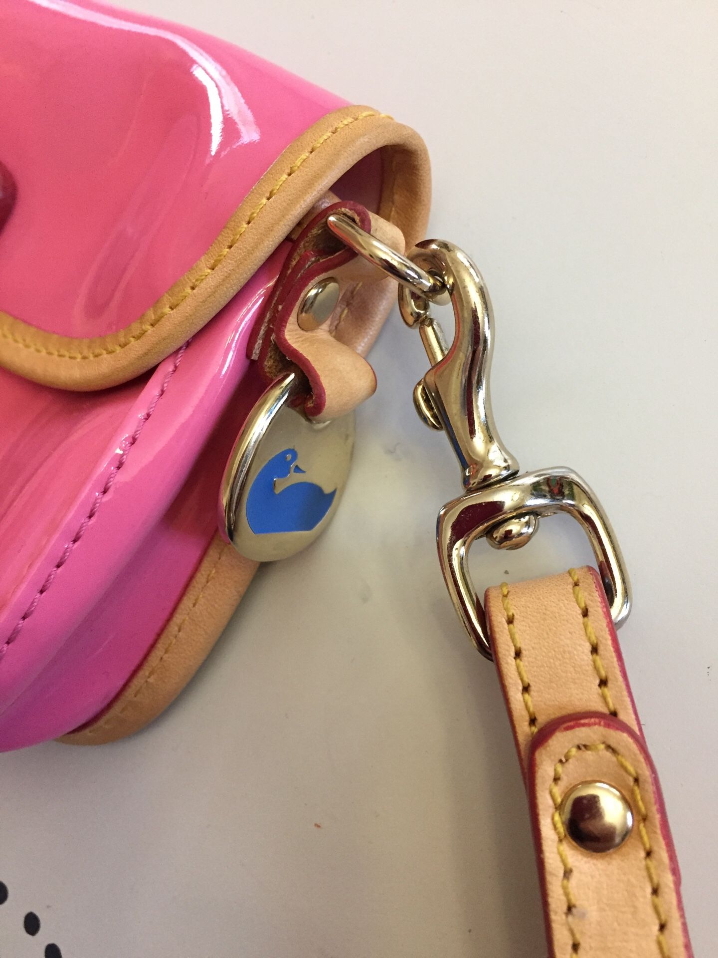 Dooney Bourke shinny pink wristlet envelop flap bag