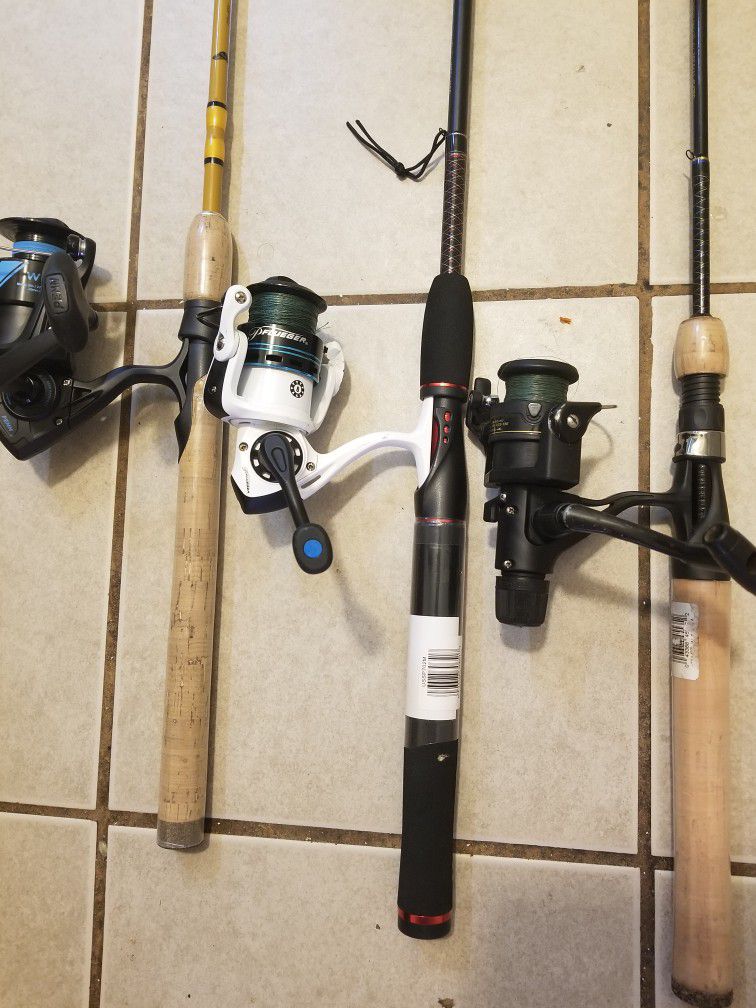 fishing pole with reels both are ugly stik & Eagle claw  reels are pflueger penn  shimano both ugly stik 7ft & 6"6ft nice set up 