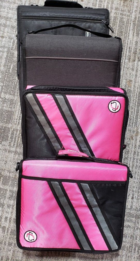 Lots of binders 2-$3 black used- 2-$10 pink brand new