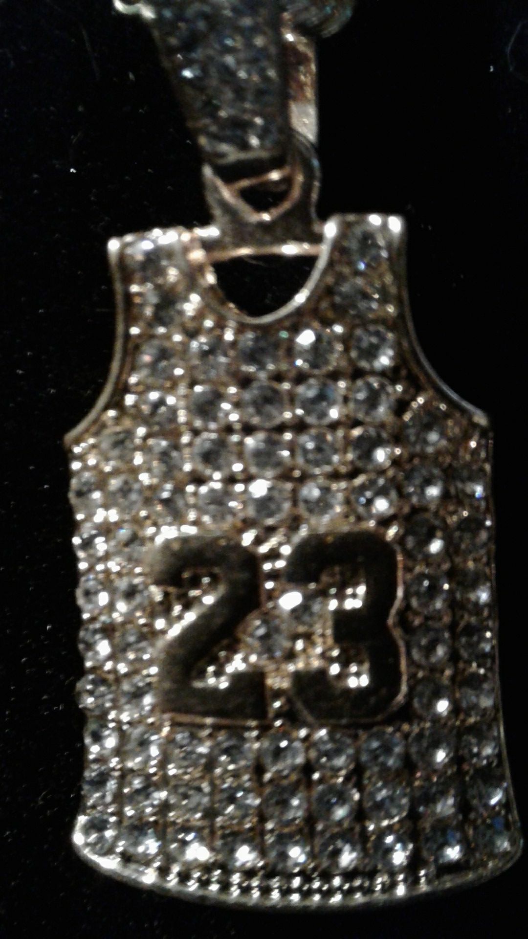 In Gold a Iced out Jersey with #23 & Chain $20