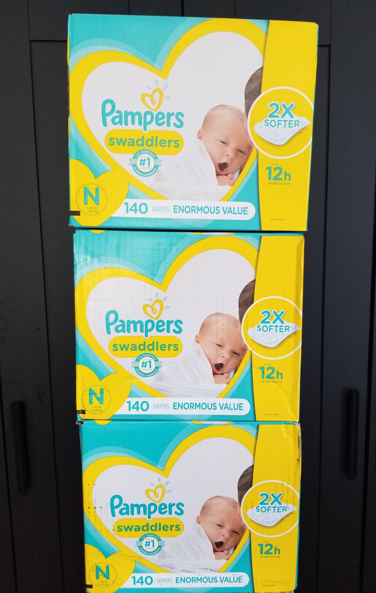 2 boxes..Pampers swaddlers size newborn enormous value pack