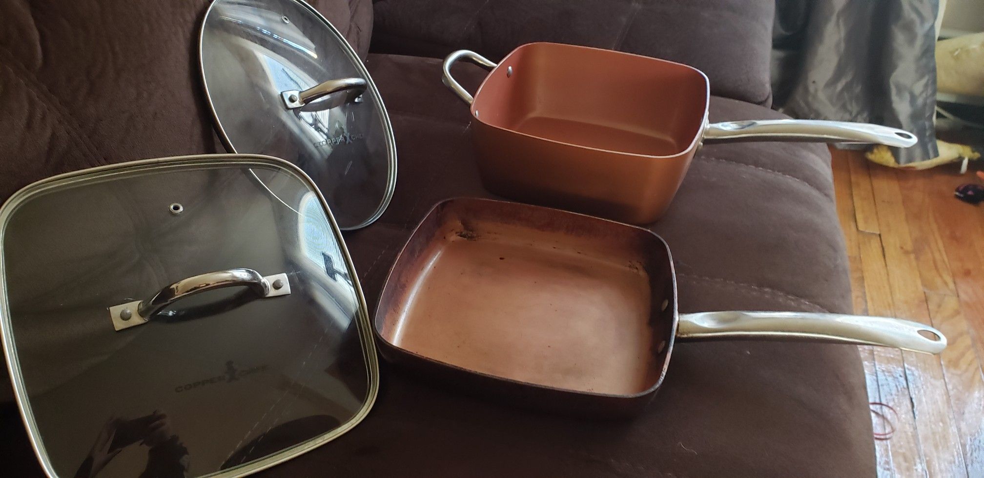 COPPER CHEF FRYING PAN ,DEEP SQUARE HOLDS 4.5 QUART PAN POT, 2 LIDS COOK OVER GAS, ELECTRIC I WOULD ALSO PUT THEM IN THE STOVE WITHOUT LIDS.