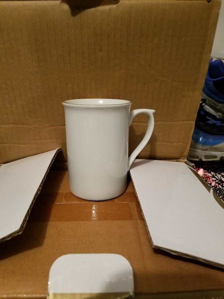 Gibson coffee cups.