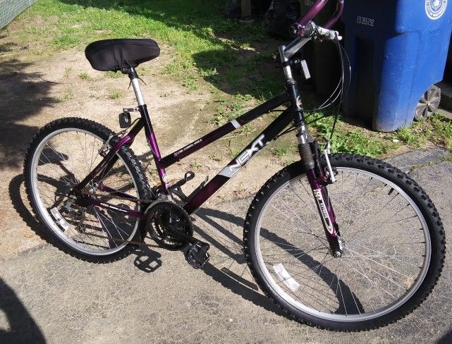 Next 26 in 18 speed Ultra all terrain, shock system, all Shimano equipped, Shimano derailleur sis EST extreme shock, Promax brakes, grips Promax brake