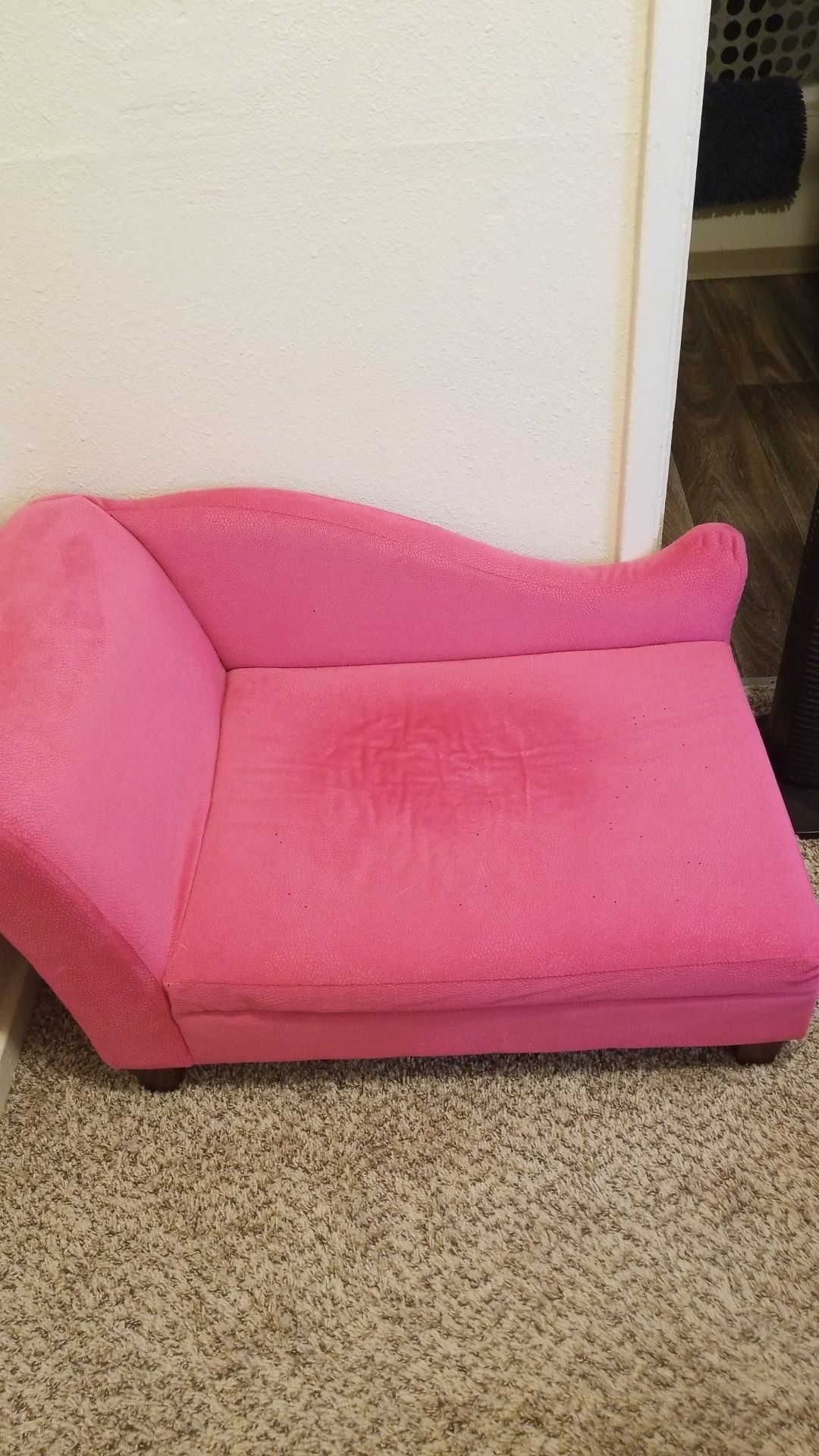 Pink dog couch