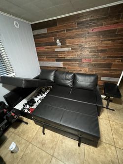 Black leather couch- $100 OBO Thumbnail