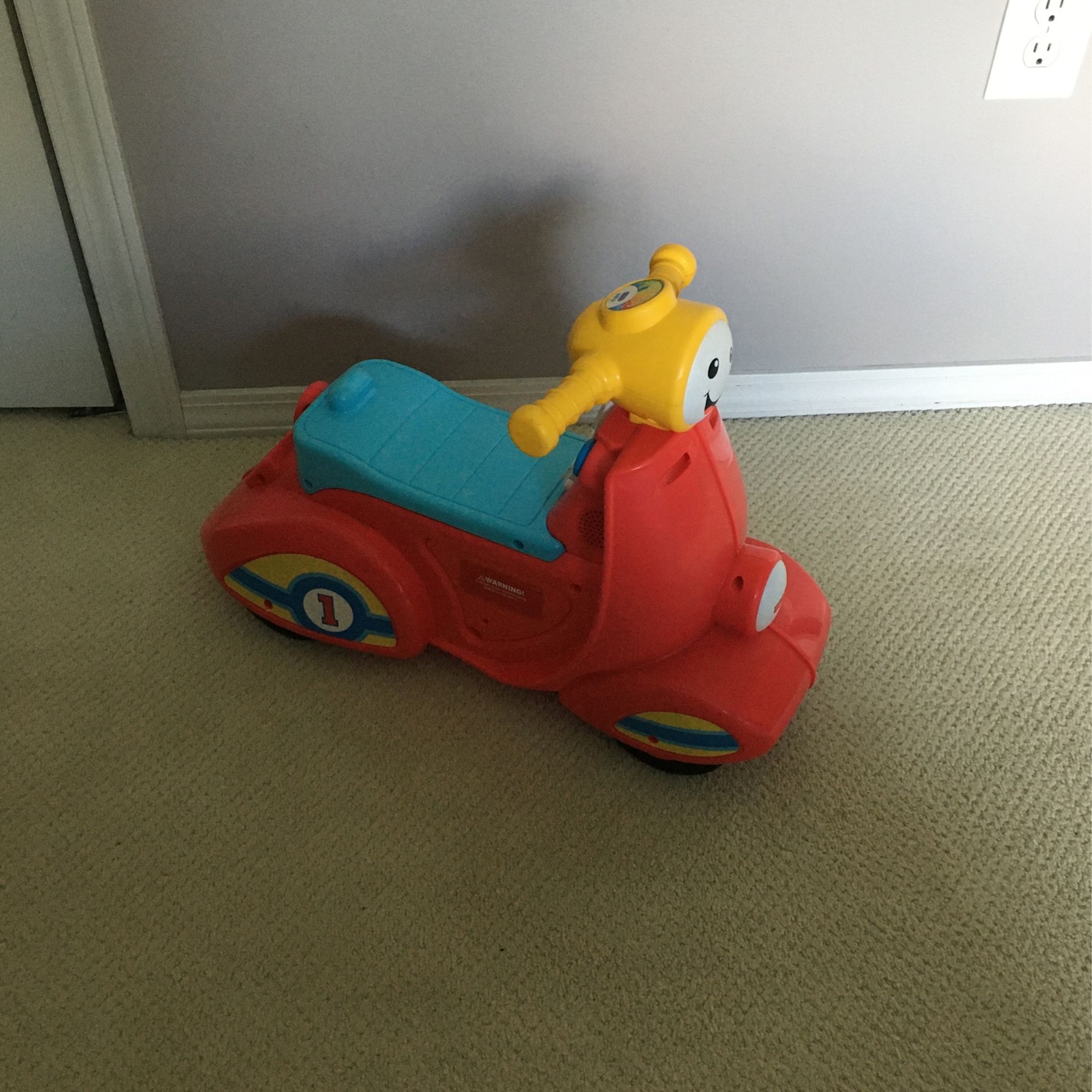 Fisher-Price Laugh & Learn Smart Stages Scooter