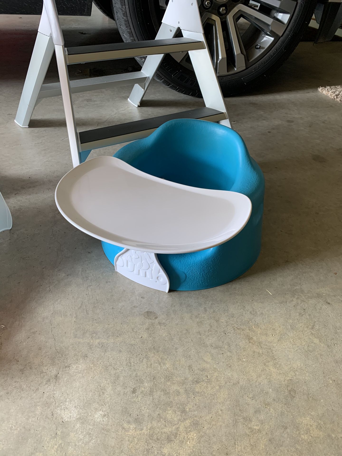 Baby jumper, formoms high chair, shower/bath lounger and a bumbo chair