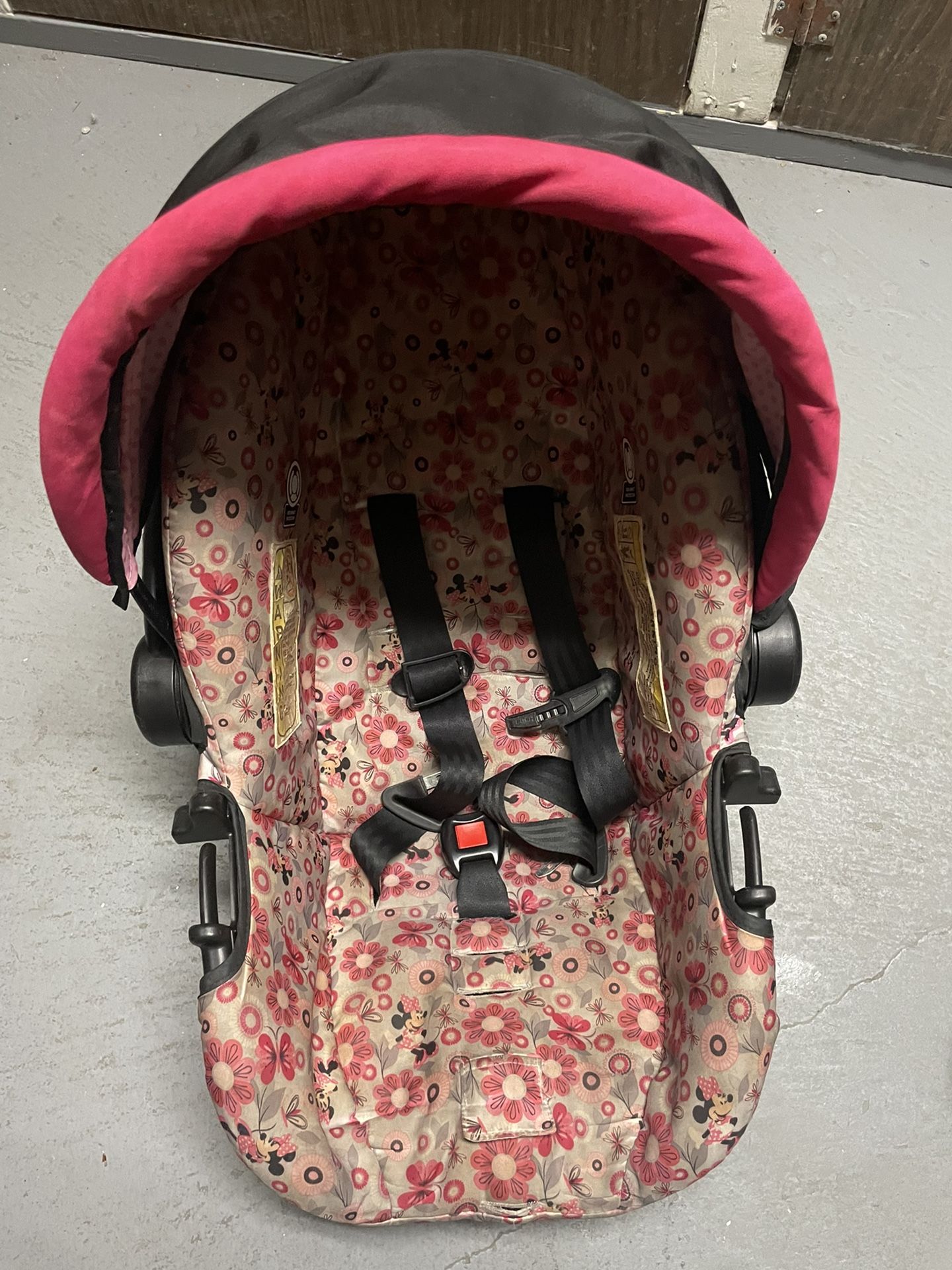 A baby Girl Car seat