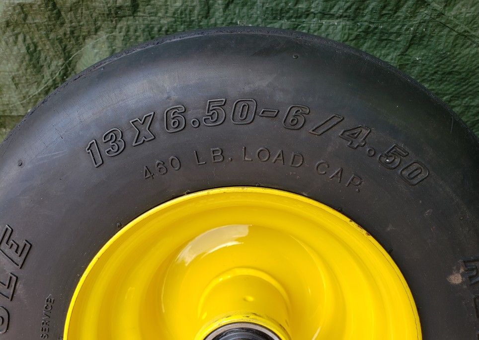 Pair of 13x6 50 6 reliance flat free ribbed lawnmower tires on jd