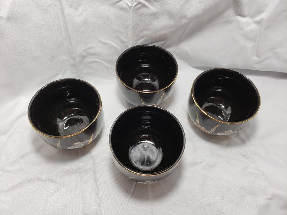 Vintage Ottagiri japan tea cups black with floral design good condition and smoke free home. Measures 2 1/2" T X 3" W .
