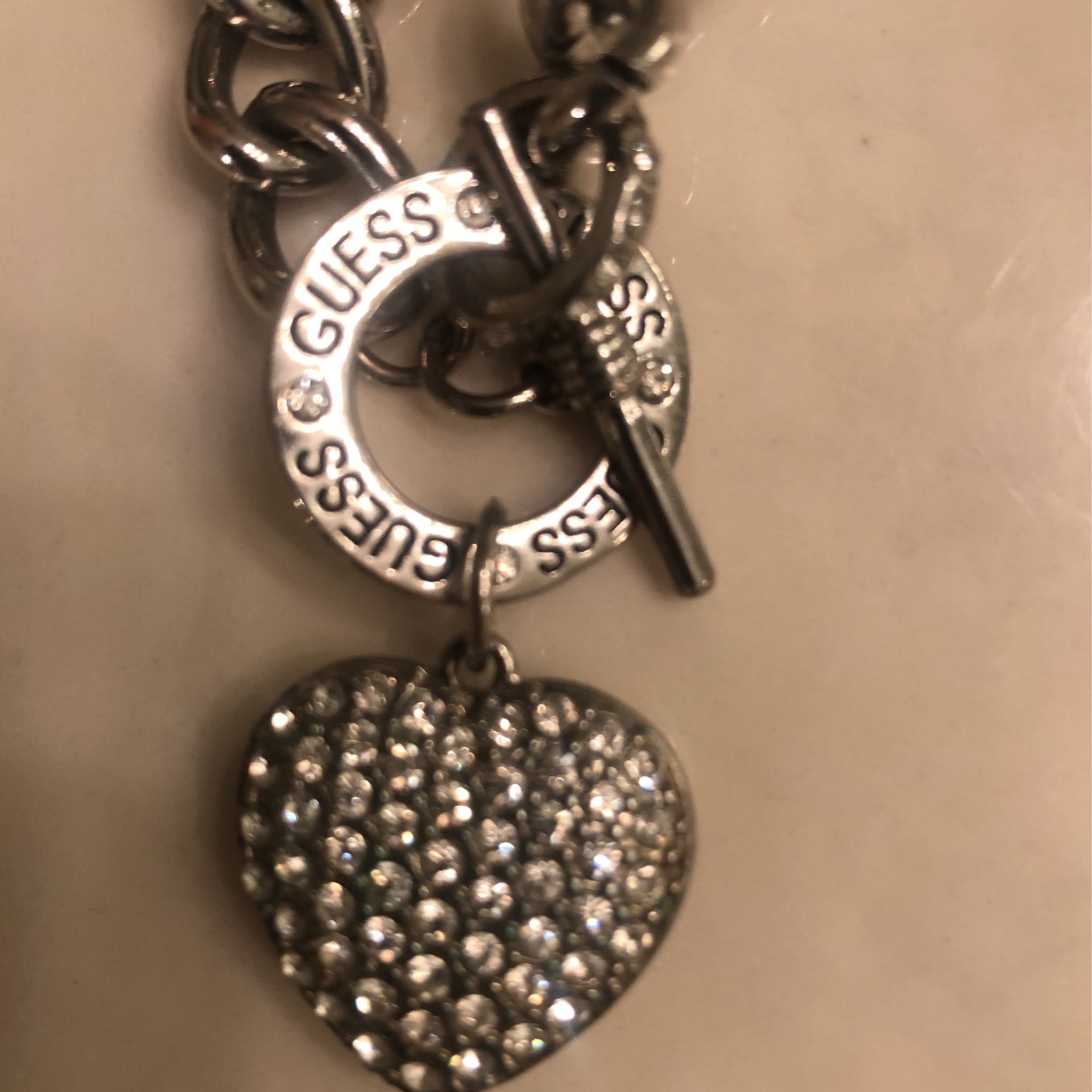 Guess Silvertone choker necklace