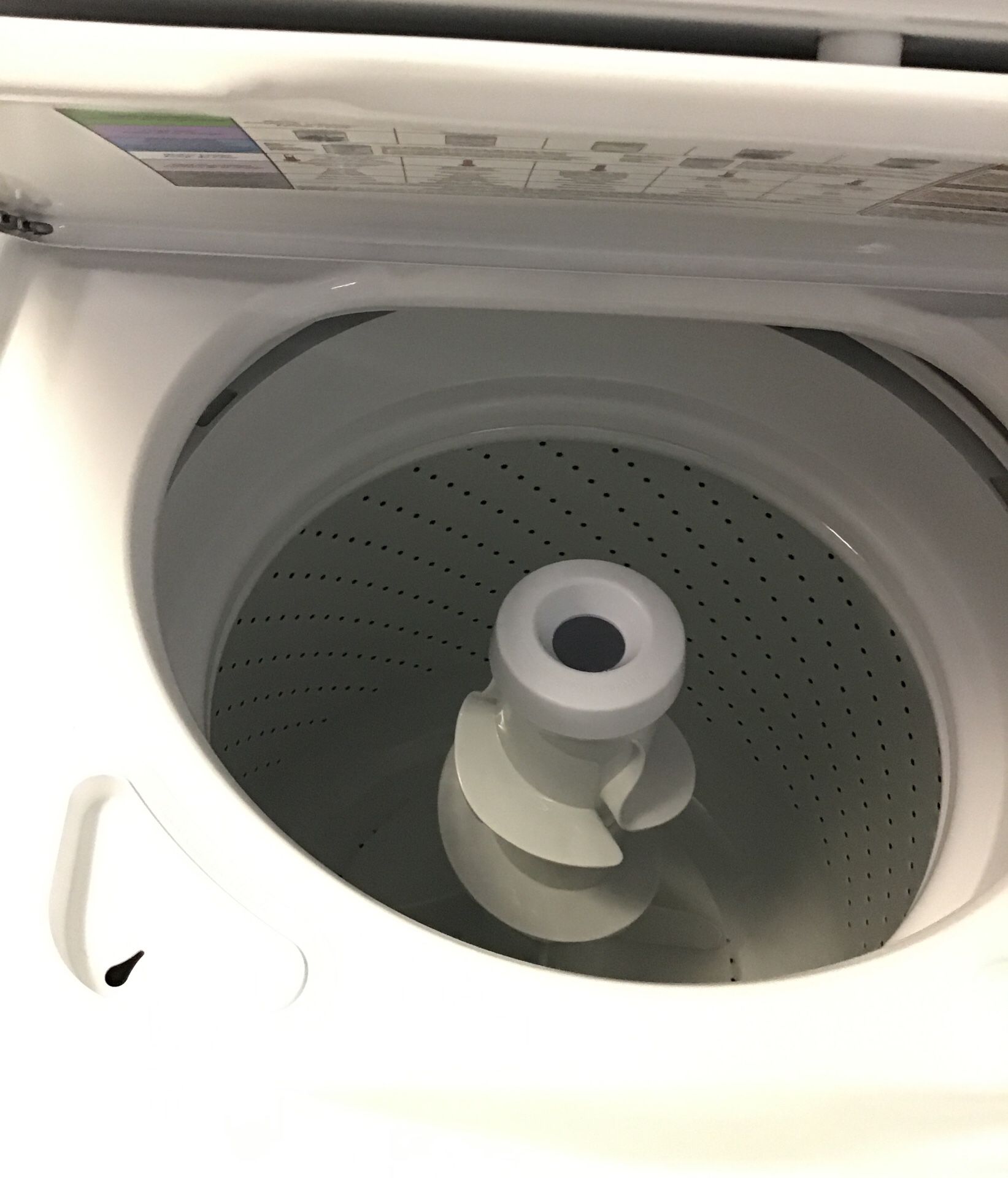 New scratch and dent whirlpool stackable washer and dryer. 1 year warranty
