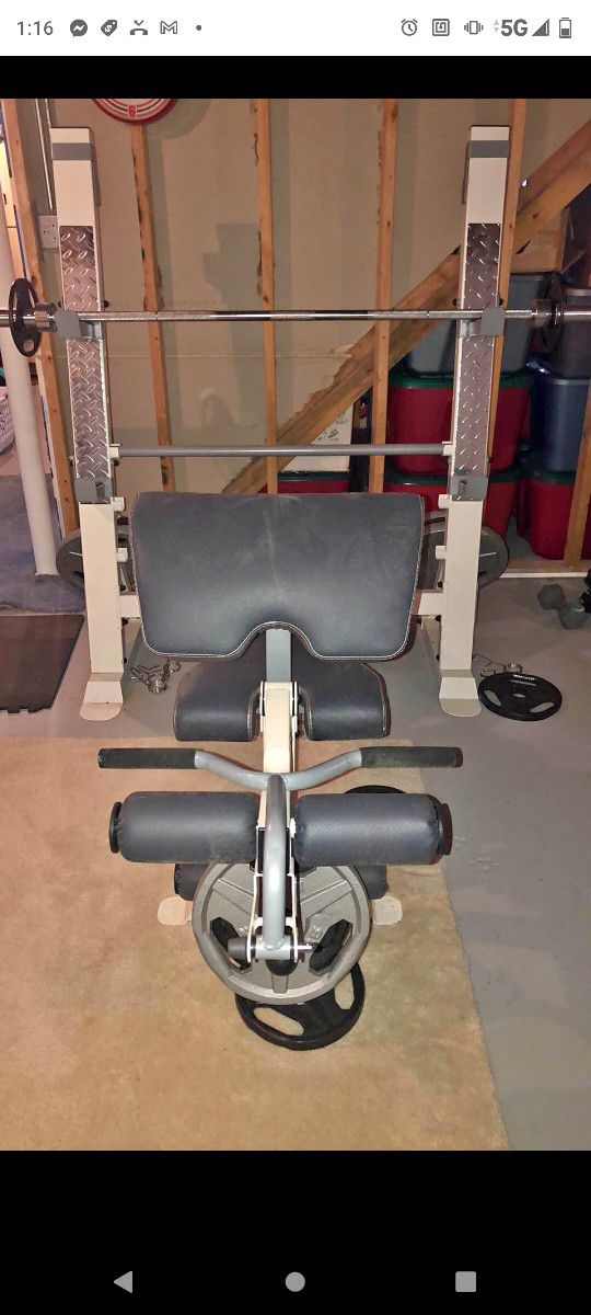 POWERHOUSE WEIGHT BENCH WITH 300 LB OLYMPIC WEIGHT SET ( LIKE NEW & DELIVERY AVAILABLE TODAY)