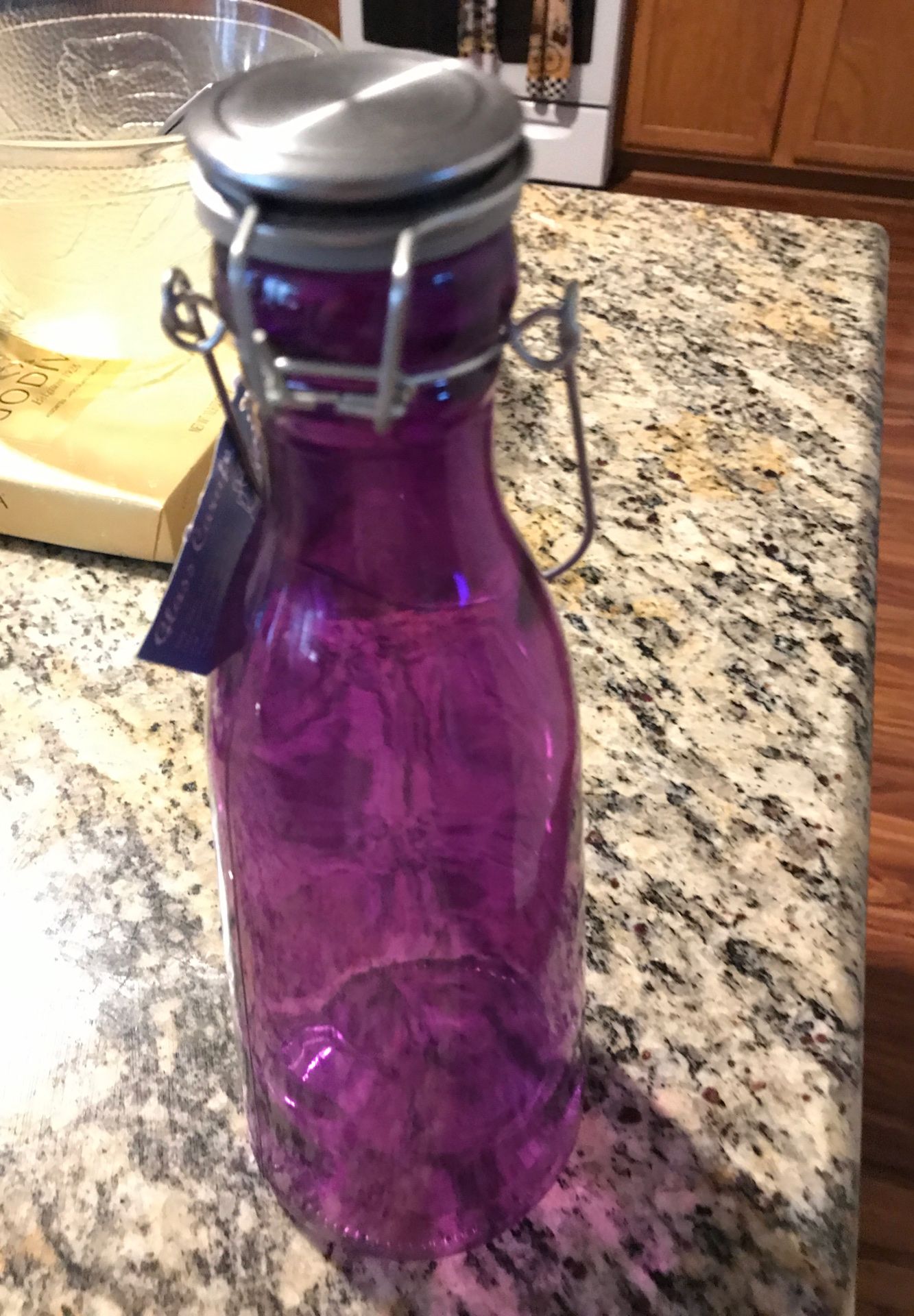 New purple glass carafe with lid and handle