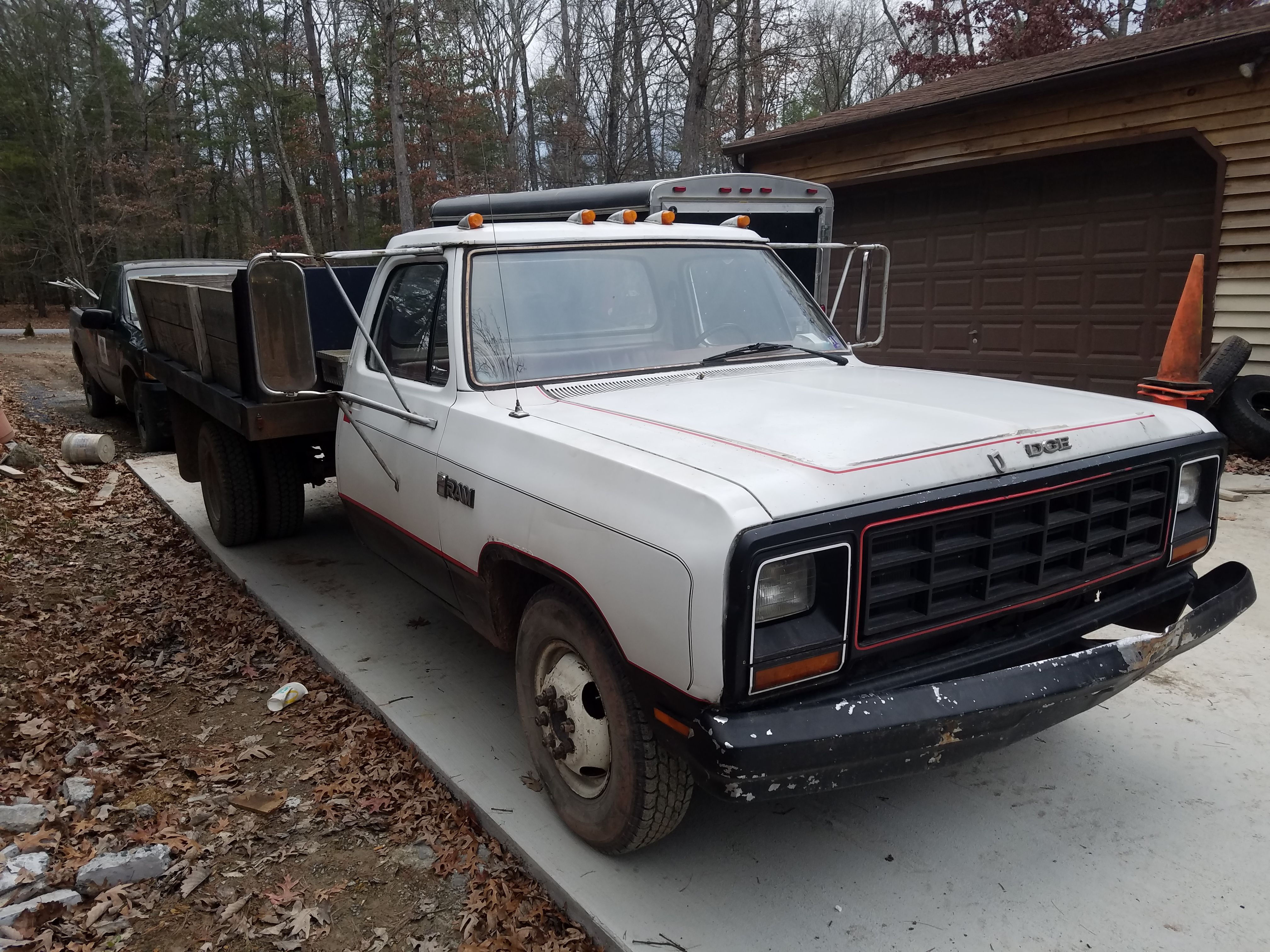 1984 dodge dump and 2012 trailer