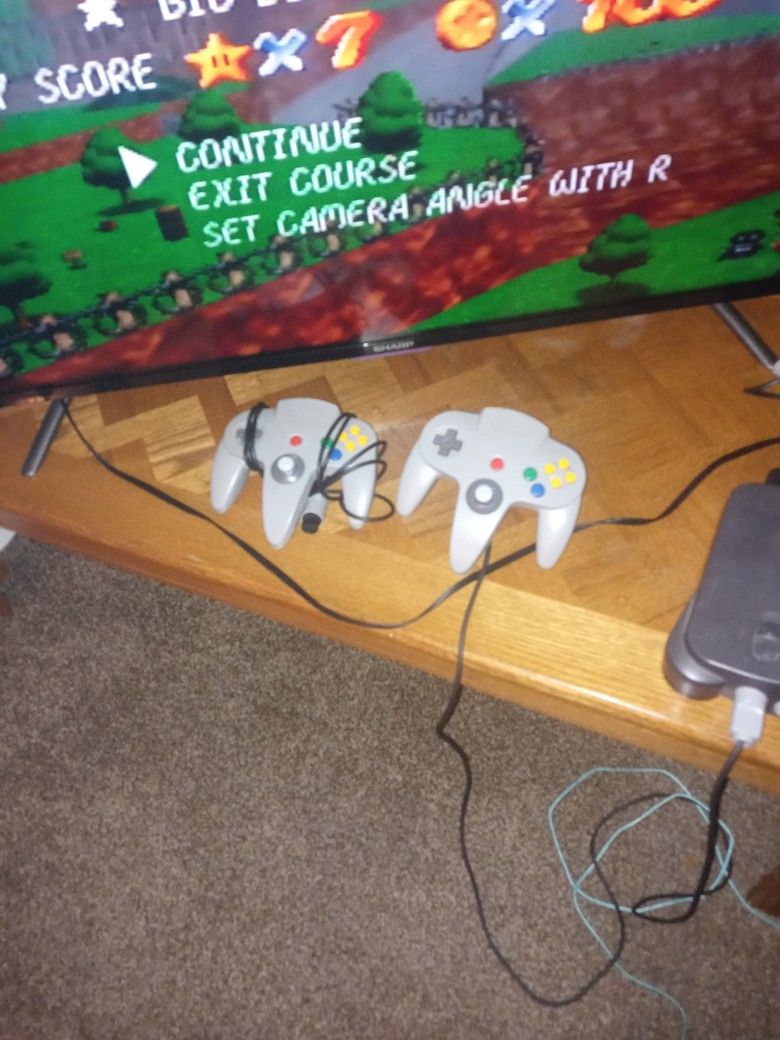 Nintendo 64 Console, Controller, And Games