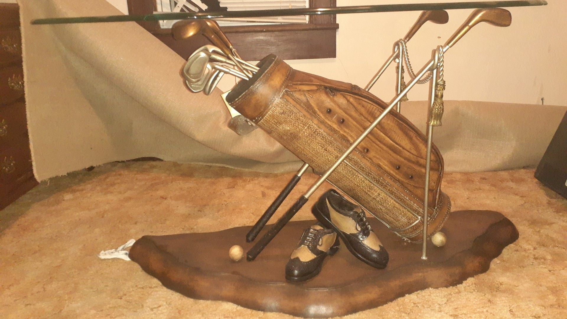 Glass top golf club console table