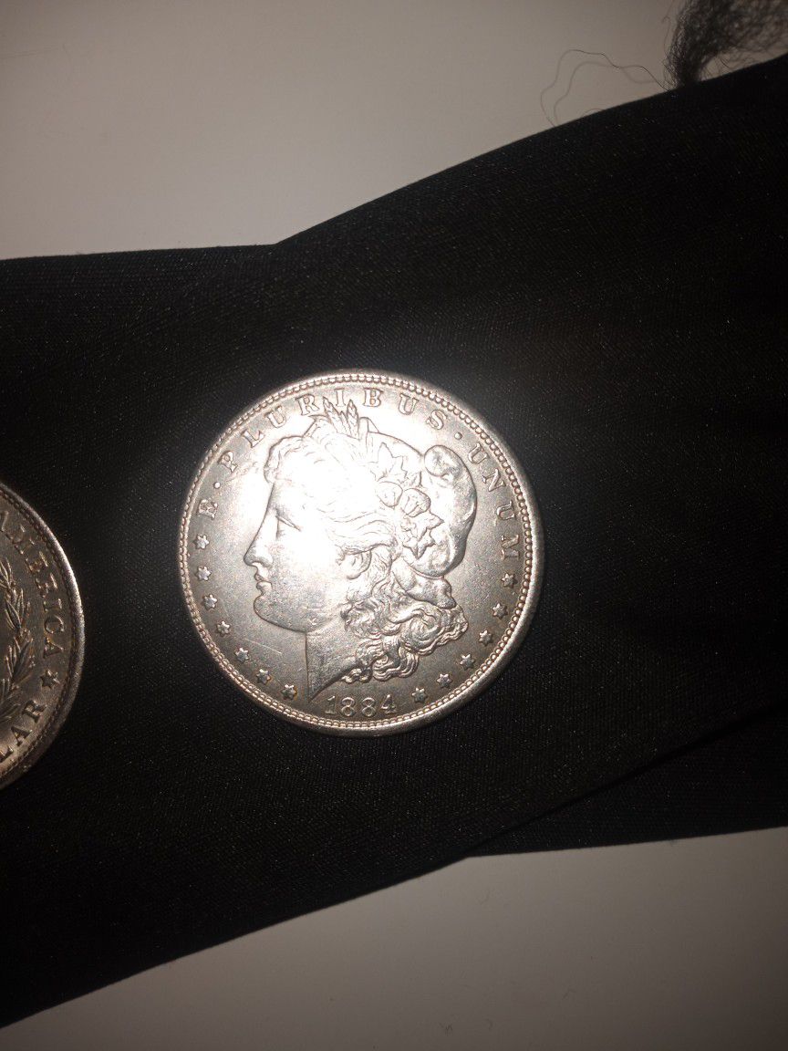1884 And 1888 Morgan Silver Dollars 