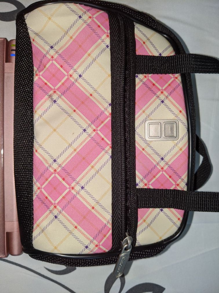 Nintendo Dsi XL, charger and accessory case in coral