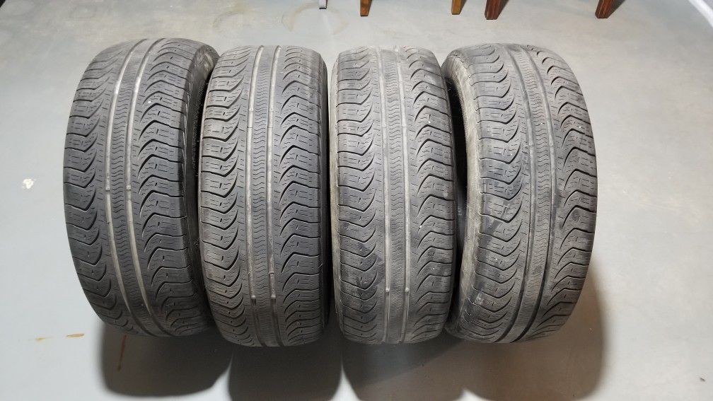 Set of 4 Pirelli P4 Four Seasons Plus 205 55 16 91H tires