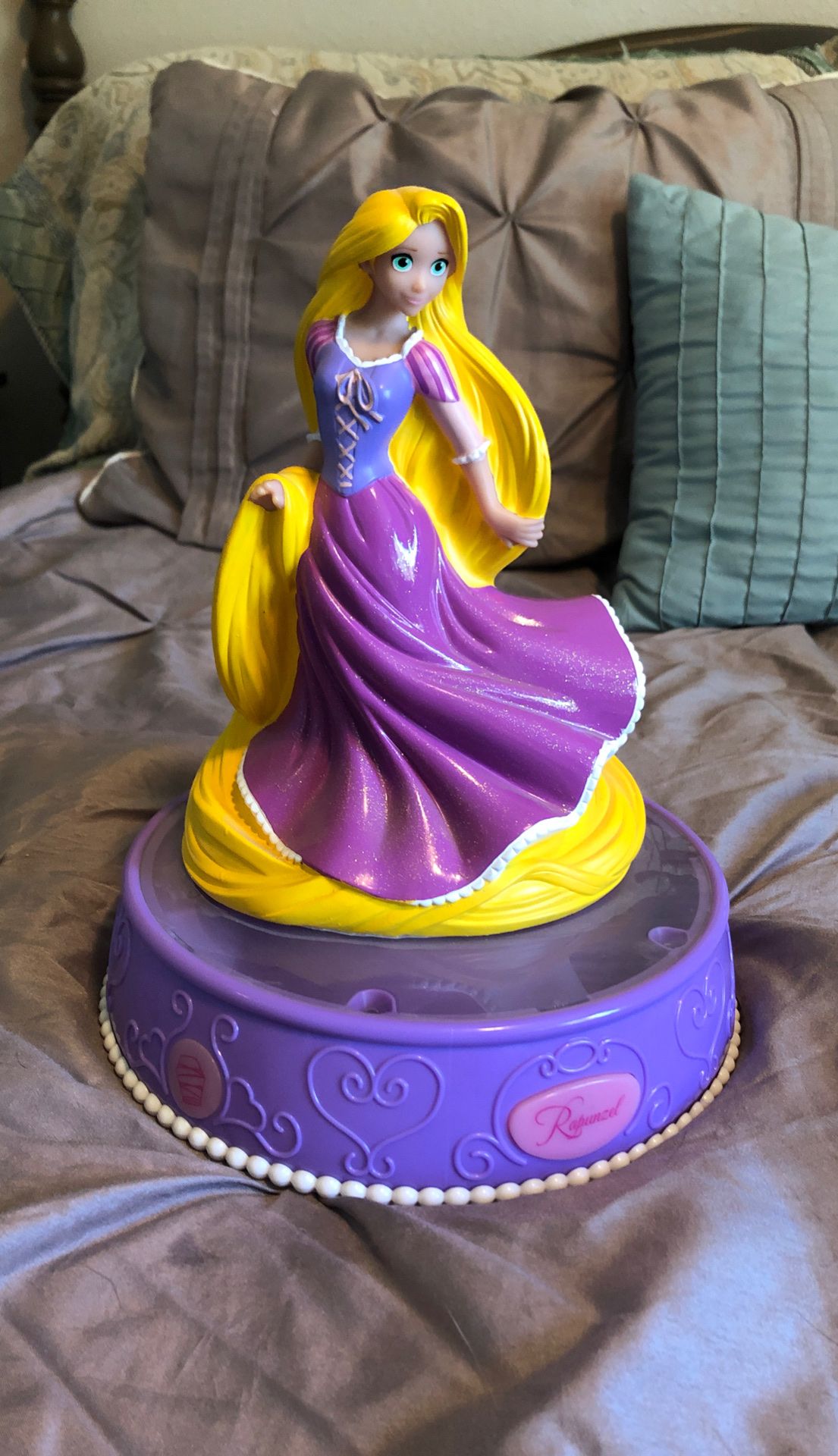 Rapunzel singing piggy bank