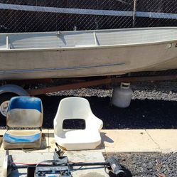 14 ft Sears aluminum boat w/folding trailer and extras. Thumbnail