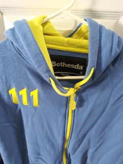 Bethesda Blue and Yellow Fallout 4 Vault 111 Full Zip Long Sleeve Hoodie Mens Sm Thumbnail