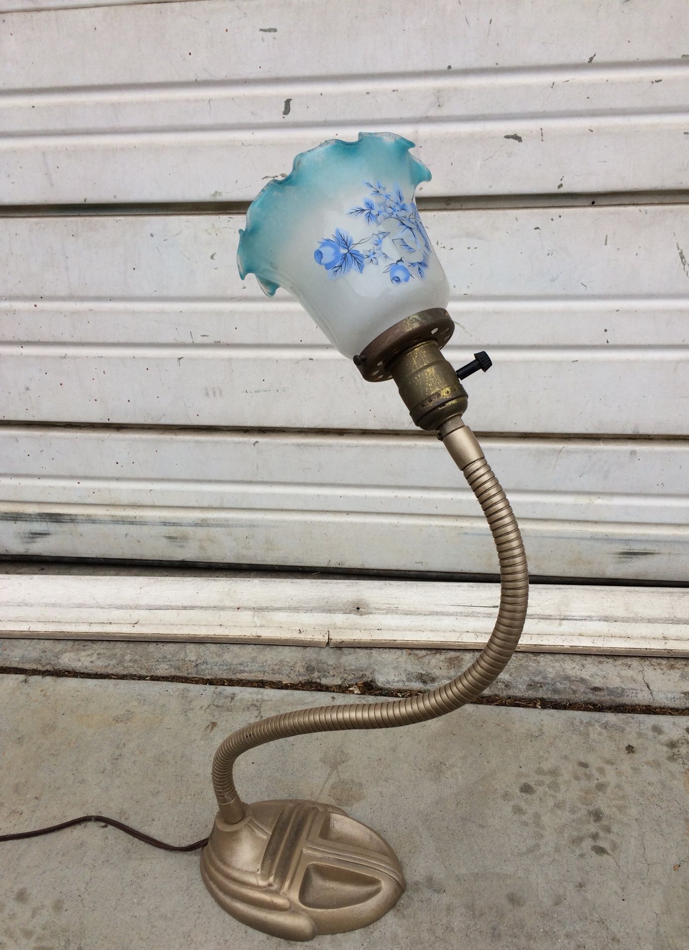 Desk lamp with blue flowered glass